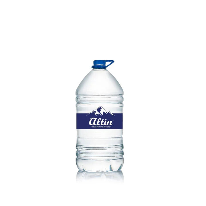 Large clear plastic bottle of natural mineral water with blue cap and label